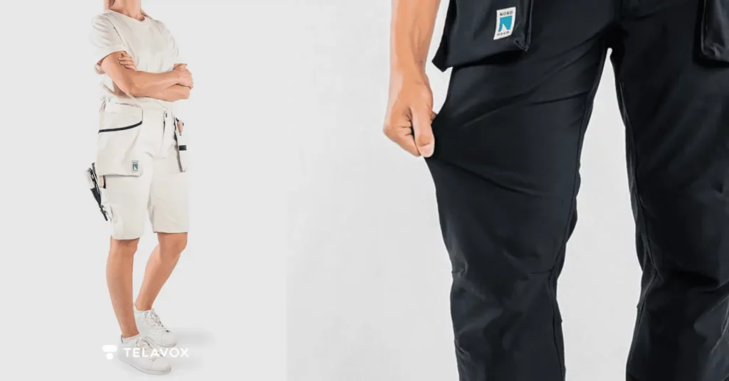 Kvinne med hvit Nordhaus arbeidsoverall og mann i forgrunnen med mørke arbeidsbukser